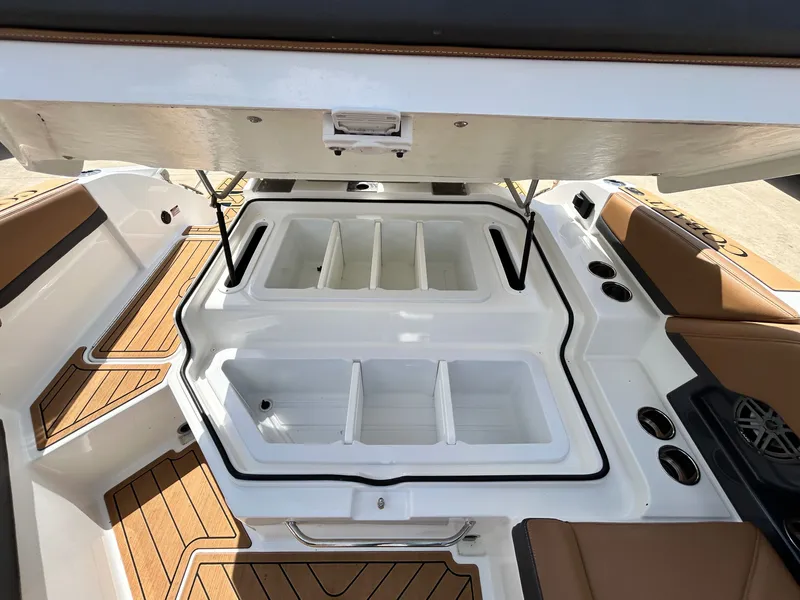 Slide: The Image of Cobalt R4 Outboard 2022 with open storage and wood flooring. - 48