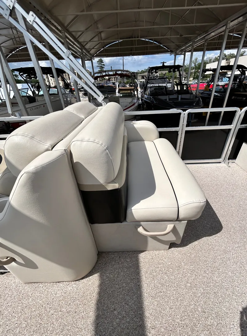 Slide: The Image of Cypress Cay SEABREEZE 23 boat seat, 2012 model, in covered dock. - 29