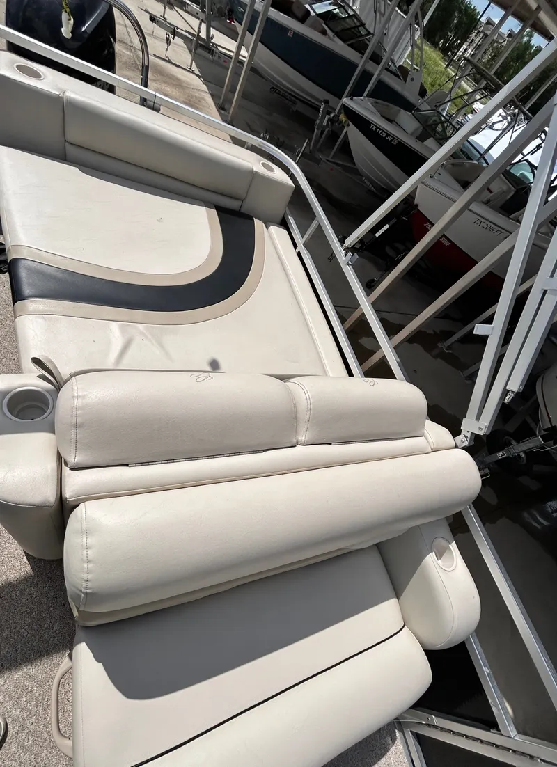 Slide: The Image of Cypress Cay SEABREEZE 23 boat, interior view, 2012 model, reclining seat. - 35
