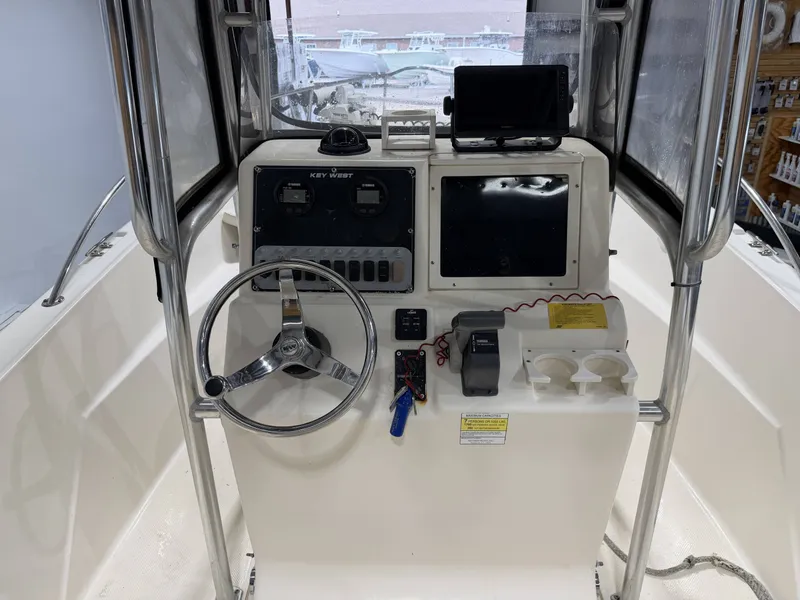 Slide: The Image of Helm console of a 2005 Key West 225 boat. - 5