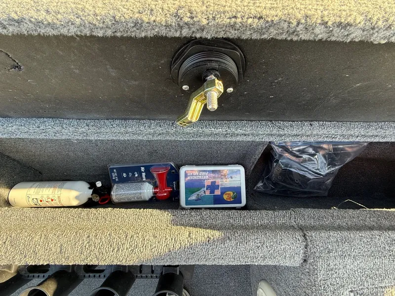 Slide: The Image of 2009 Alumacraft Pro 175 boat storage with safety equipment. - 19