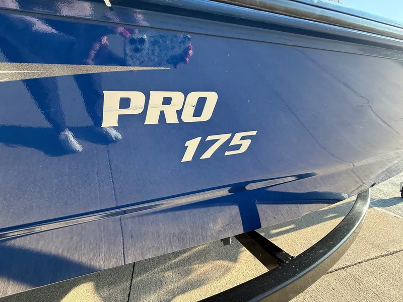 Slide: The Image of 2009 Alumacraft Pro 175 boat in blue with lettering. - 3
