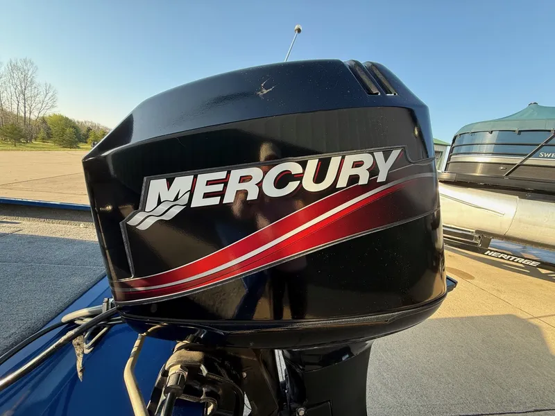 Slide: The Image of Mercury outboard motor on Alumacraft Pro 175 boat, year 2009. - 9