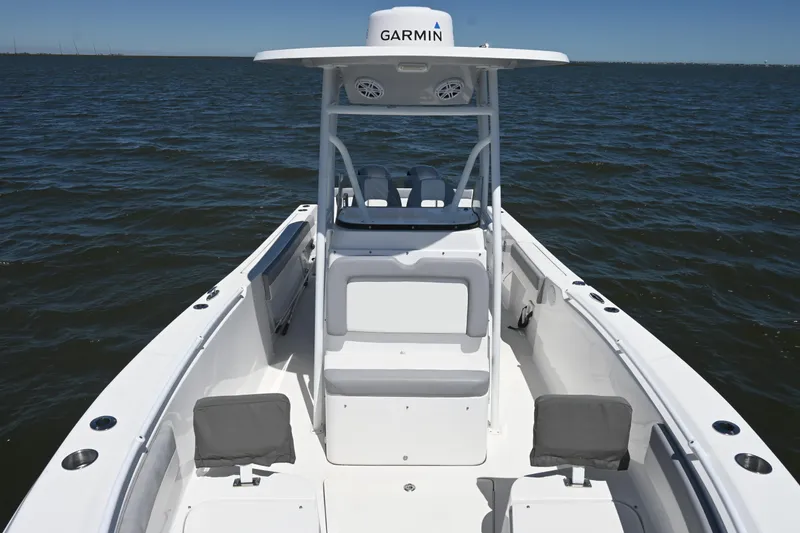 Slide: The Image of 2022 Release 240 RX boat on open water, featuring Garmin equipment. - 17