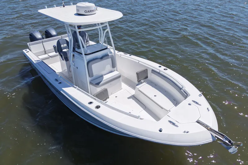 Slide: The Image of 2022 Release 240 RX boat on water, featuring dual engines and a sleek design. - 5