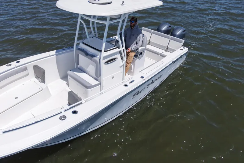 Slide: The Image of 2022 Release 240 RX boat on water, featuring dual engines and sleek design. - 8