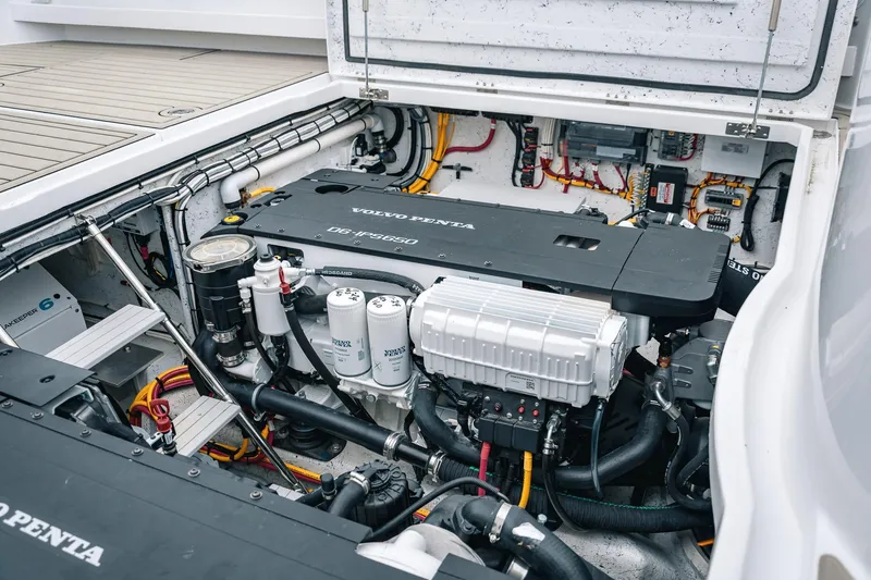 Slide: The Image of Engine compartment of 2024 Lindell 46 boat featuring Volvo Penta D6-IPS650 engine. - 11