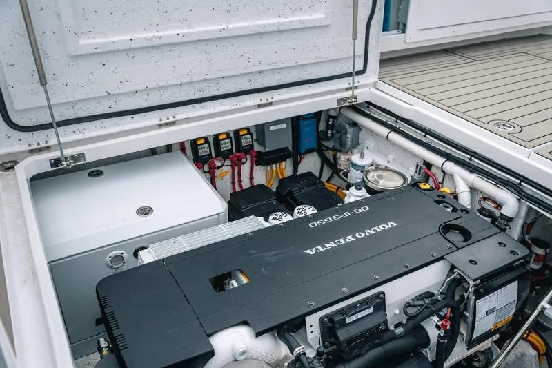 Slide: The Image of Engine compartment of 2024 Lindell 46 boat featuring Volvo Penta D6-IPS650 engine. - 12