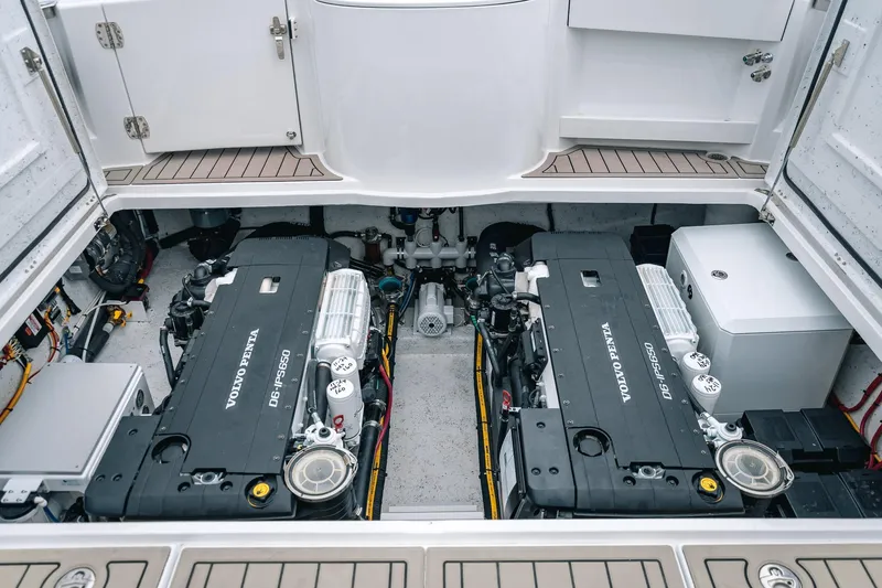 Slide: The Image of Engine compartment of 2024 Lindell 46 boat featuring dual Volvo Penta D6-IPS650 engines. - 15