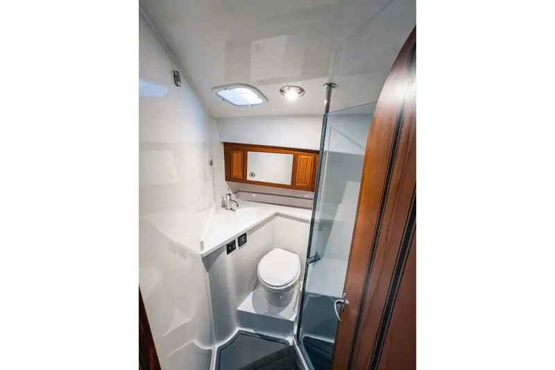 Slide: The Image of Modern bathroom interior in 2024 Lindell 46 yacht, featuring sleek design and wooden accents. - 39