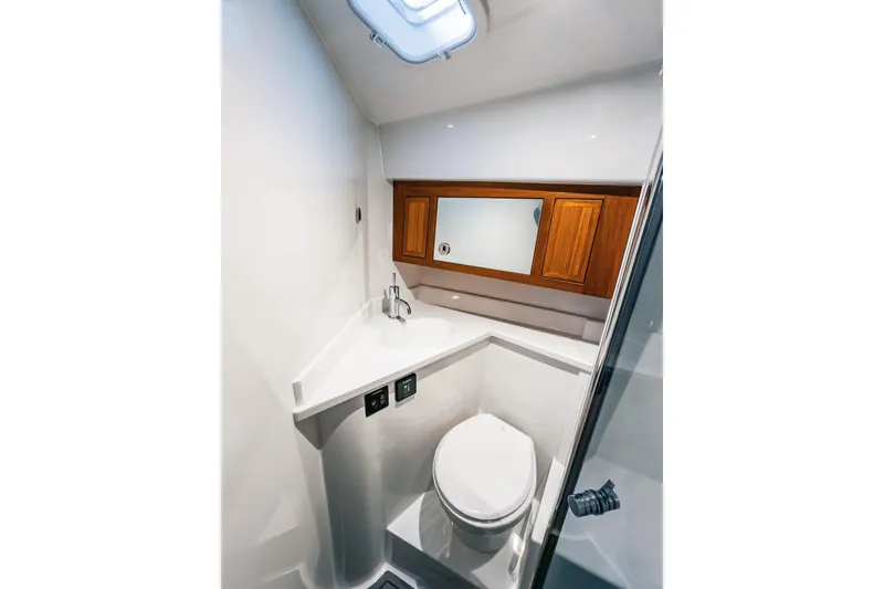Slide: The Image of Modern bathroom in 2024 Lindell 46 yacht, featuring sleek design and wooden cabinetry. - 40