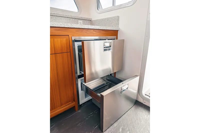 Slide: The Image of Stainless steel double-drawer refrigerator in 2024 Lindell 46 yacht interior. - 51