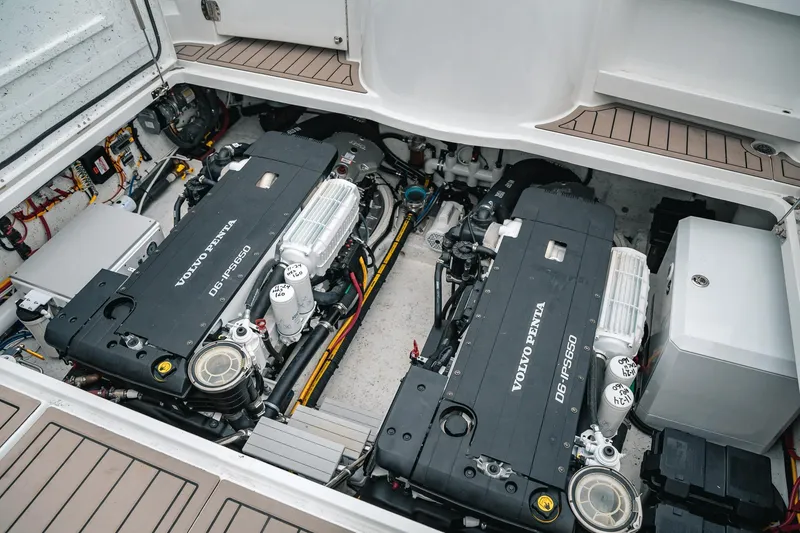 Slide: The Image of Engine compartment of 2024 Lindell 46 boat with dual Volvo Penta D6-IPS650 engines. - 77