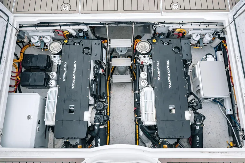 Slide: The Image of Engine compartment of 2024 Lindell 46 boat with dual Volvo Penta engines. - 9