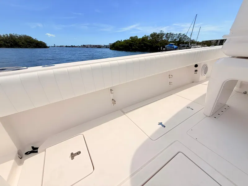 Slide: The Image of Intrepid 327CC 2020 boat, spacious deck with water view. - 38
