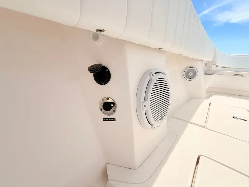 Slide: The Image of Intrepid 327CC 2020 boat interior with speakers and connections. - 39