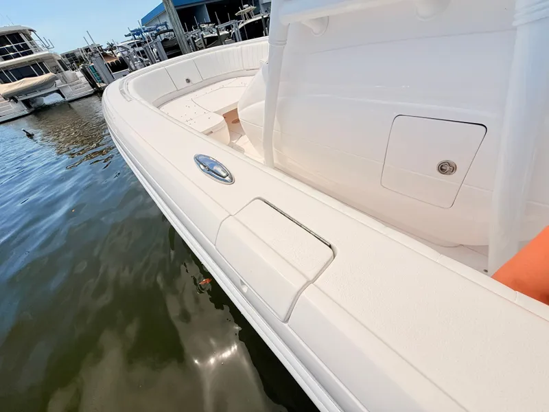Slide: The Image of Intrepid 327CC boat from 2020 docked at marina. - 40