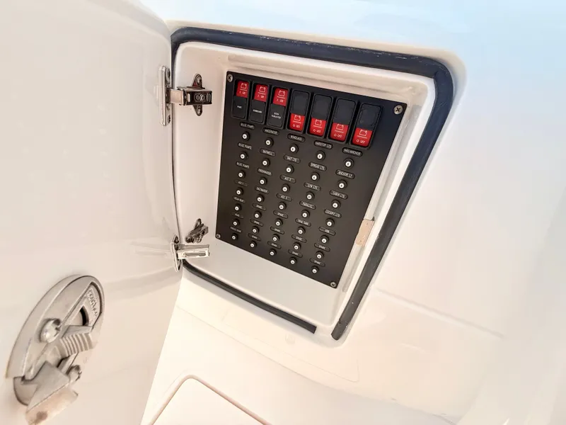 Slide: The Image of Intrepid 327CC 2020 control panel in open compartment. - 43