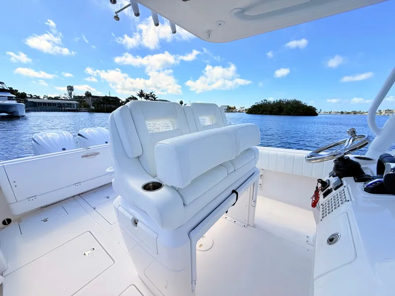 Slide: The Image of Intrepid 327CC 2020 boat with luxurious cockpit and water view. - 45