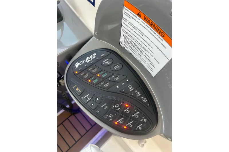 Slide: The Image of Control panel of 2008 Cruisers Yachts 415 Express Motoryacht with warning label. - 18