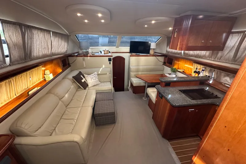 Slide: The Image of Luxurious interior of 2008 Cruisers Yachts 415 Express Motoryacht with elegant seating and kitchen area. - 21