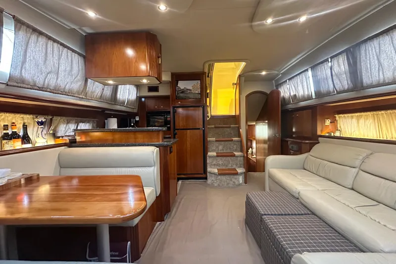 Slide: The Image of Luxurious interior of 2008 Cruisers Yachts 415 Express Motoryacht with elegant wood finishes. - 25
