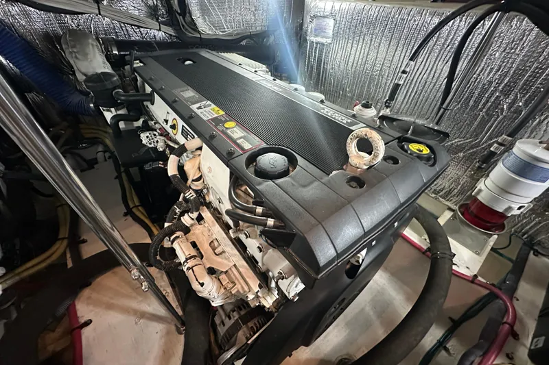 Slide: The Image of Engine room of 2008 Cruisers Yachts 415 Express Motoryacht, showcasing detailed machinery. - 38