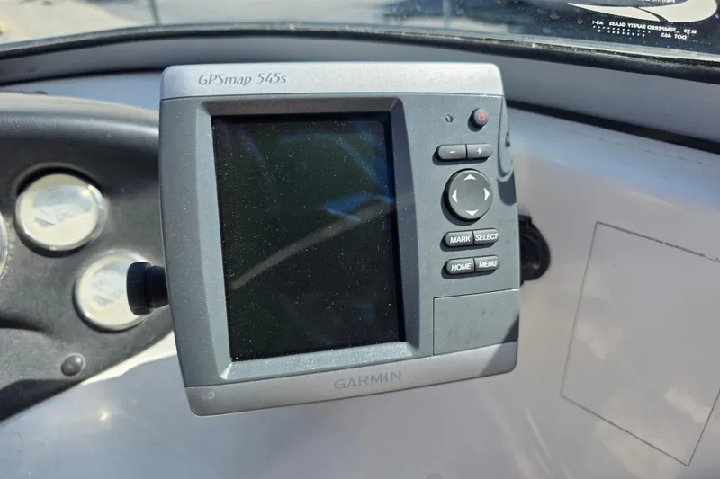 Slide: The Image of Garmin GPSmap 545s on 2014 Reinell 207 LS boat dashboard. - 12