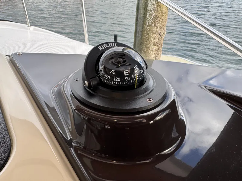Slide: The Image of Ritchie compass on 2023 Ranger Tugs R-27 boat. - 22