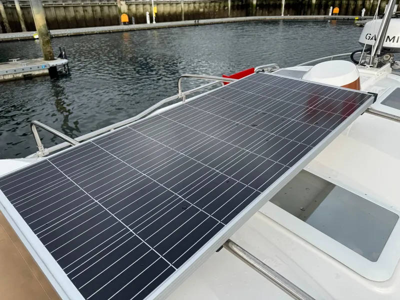 Slide: The Image of Solar panel on 2022 Ranger Tugs R-27 boat docked at marina. - 24