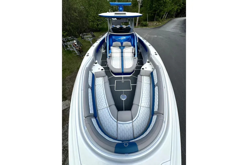 Slide: The Image of 2023 Fountain 43 NX boat with luxurious seating and sleek design. - 15