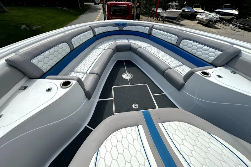 Slide: The Image of Luxurious seating area on a 2023 Fountain 43 NX boat, featuring modern design and comfort. - 16