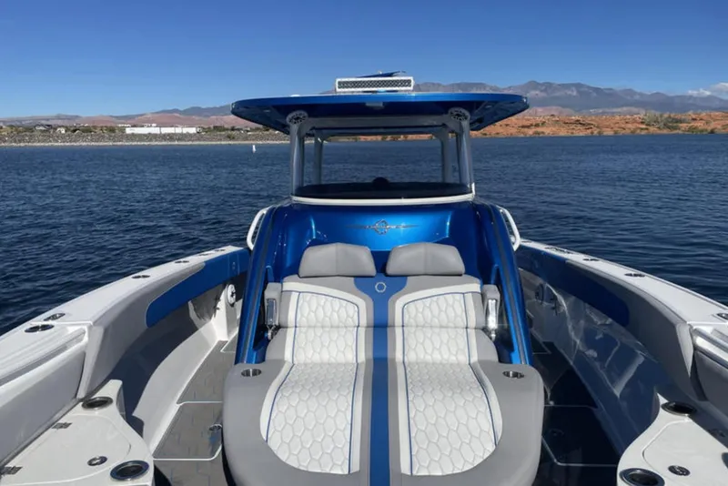 Slide: The Image of 2023 Fountain 43 NX boat on water, featuring sleek design and comfortable seating. - 5