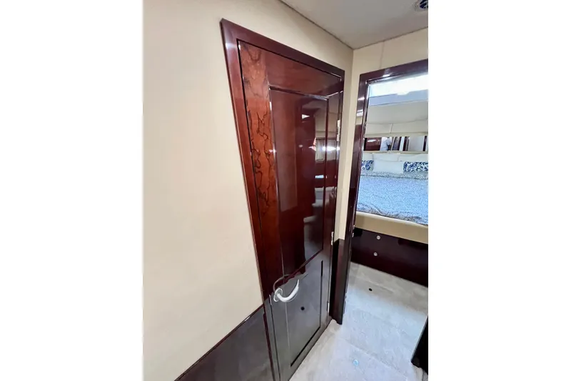 Slide: The Image of Luxurious interior of 2007 Sea Ray 58 Sedan Bridge yacht with elegant wood finish. - 122