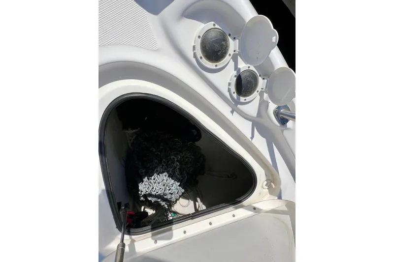 Slide: The Image of Storage compartment on a 2007 Sea Ray 58 Sedan Bridge yacht, featuring open hatches. - 22