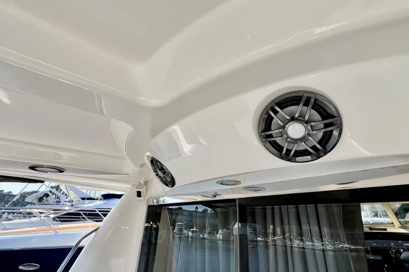 Slide: The Image of 2007 Sea Ray 58 Sedan Bridge yacht interior with speakers and sleek design. - 29