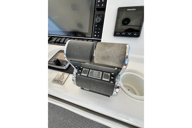 Slide: The Image of Control panel of a 2007 Sea Ray 58 Sedan Bridge yacht with navigation equipment. - 49