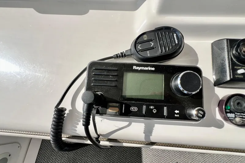 Slide: The Image of Raymarine marine radio on 2007 Sea Ray 58 Sedan Bridge yacht dashboard. - 55