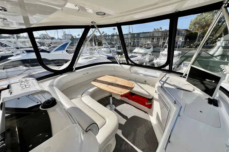 Slide: The Image of Luxurious 2007 Sea Ray 58 Sedan Bridge yacht interior with panoramic marina views. - 65