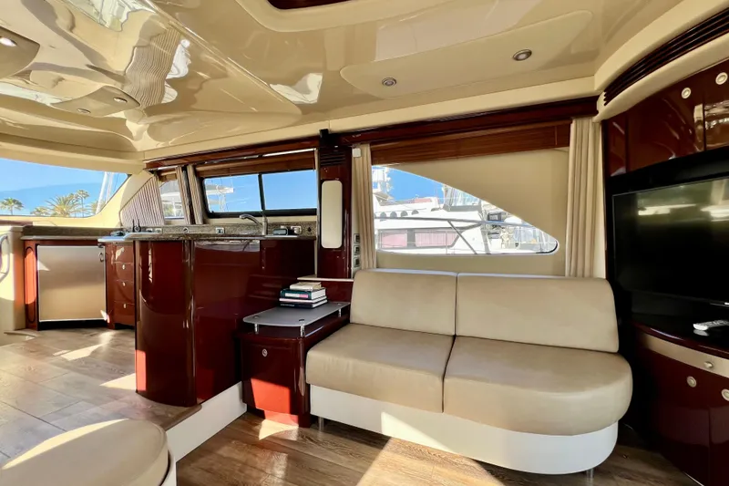 Slide: The Image of Luxurious interior of 2007 Sea Ray 58 Sedan Bridge yacht with elegant seating and modern amenities. - 75