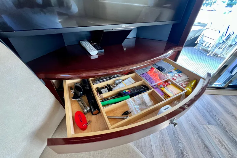Slide: The Image of Drawer with organized items on a 2007 Sea Ray 58 Sedan Bridge yacht. - 79