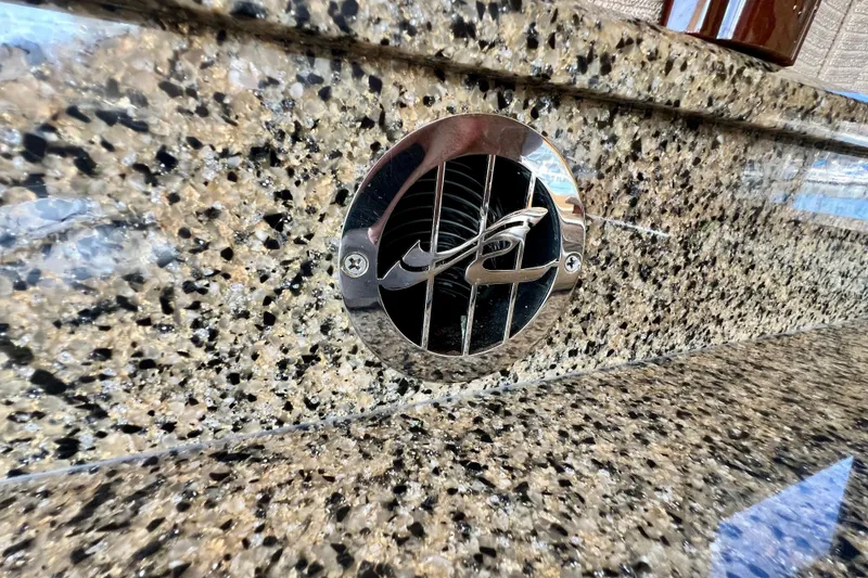 Slide: The Image of Granite countertop with a chrome vent on a 2007 Sea Ray 58 Sedan Bridge yacht. - 89