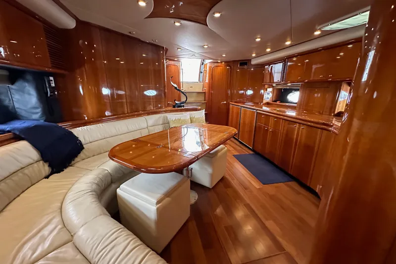 Slide: The Image of Luxurious interior of 2000 Sunseeker Predator 60 yacht with polished wood and leather seating. - 109