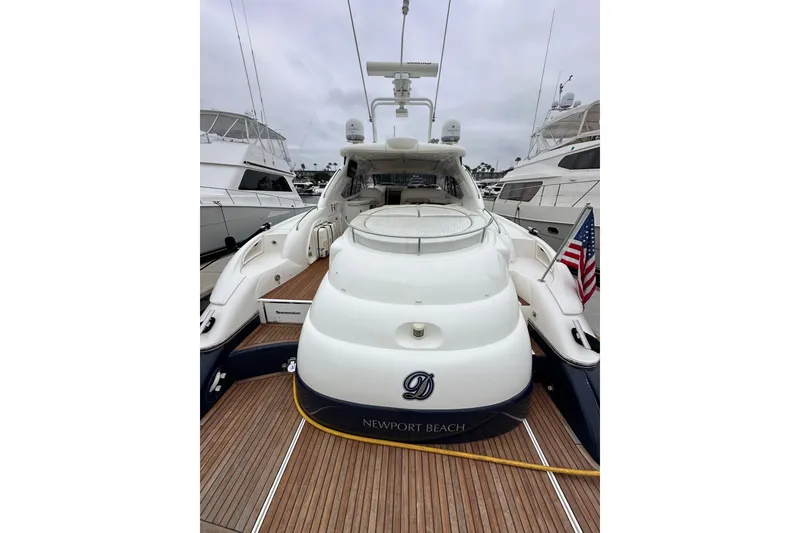 Slide: The Image of Sunseeker Predator 60 yacht, 2000 model, docked in Newport Beach marina. - 11