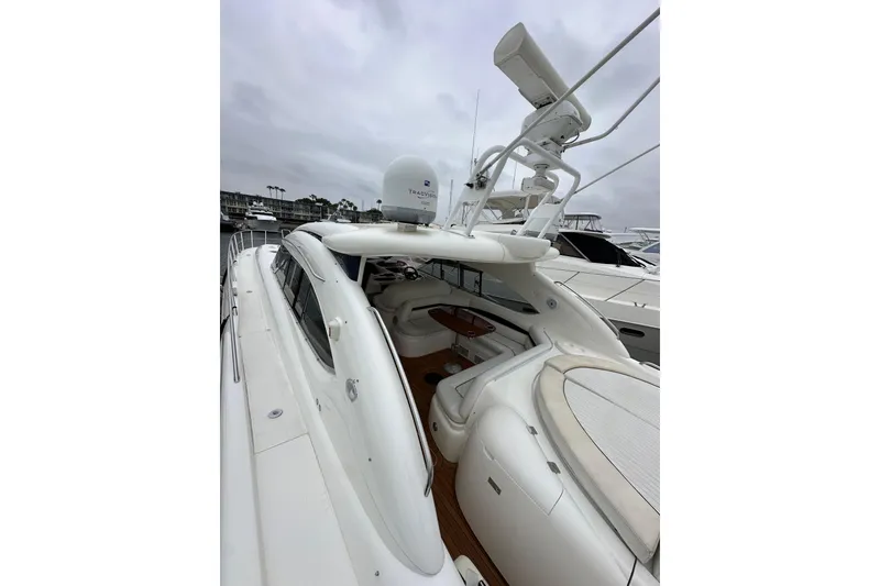 Slide: The Image of 2000 Sunseeker Predator 60 yacht with sleek design and spacious deck. - 16