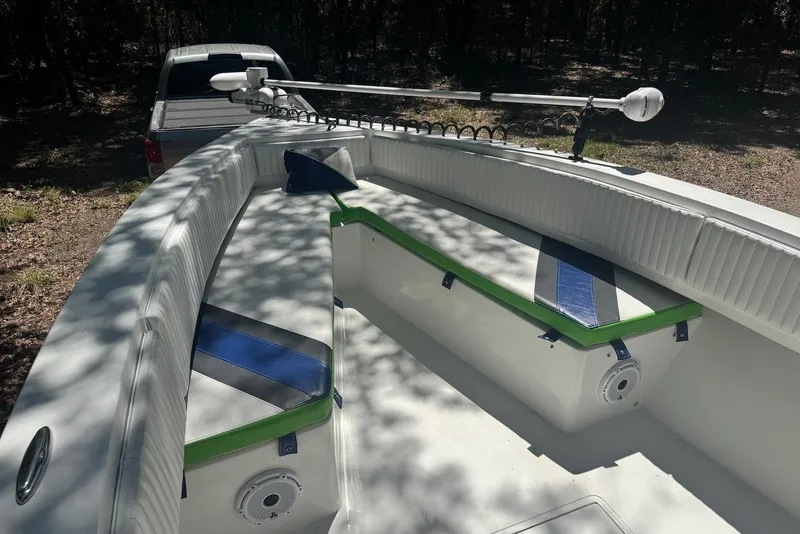Slide: The Image of 2000 Fountain 31 Tournament Edition boat interior with seating and fishing rod holder. - 11