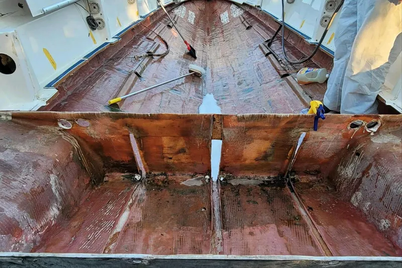 Slide: The Image of Interior view of a 2000 Fountain 31 Tournament Edition boat under maintenance. - 25