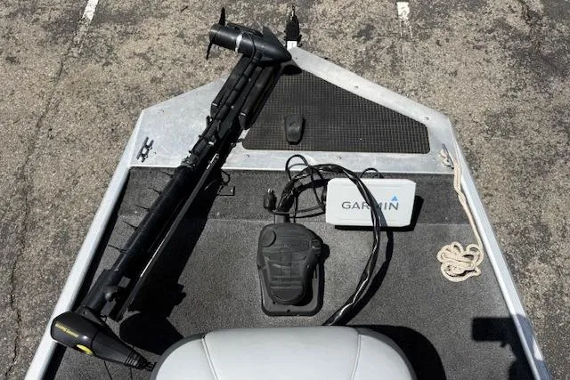 Slide: The Image of 2014 Tracker Pro 170 boat deck with Garmin equipment and trolling motor. - 19