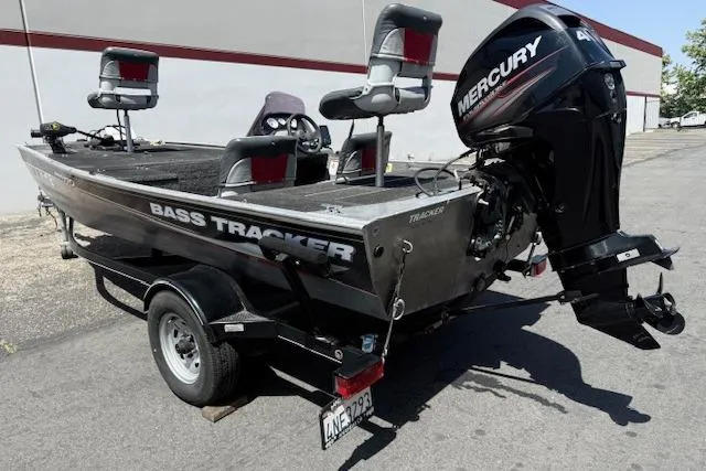 Slide: The Image of 2014 Tracker Pro 170 bass boat with Mercury engine on trailer. - 20