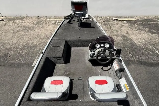 Slide: The Image of 2014 Tracker Pro 170 boat interior with steering console and seating. - 22